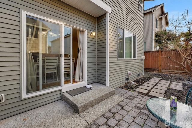 exterior space featuring fence and a patio