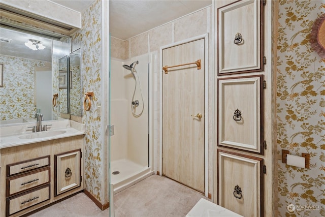 bathroom with vanity and walk in shower