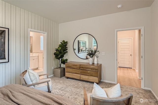 living area with light colored carpet