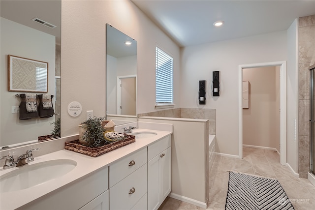 bathroom with vanity and plus walk in shower