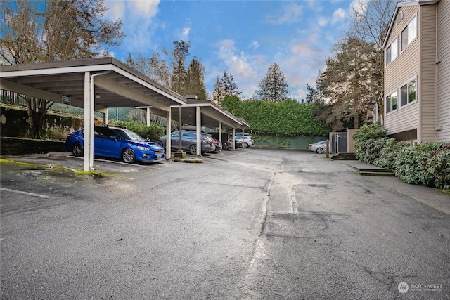 view of parking with a carport