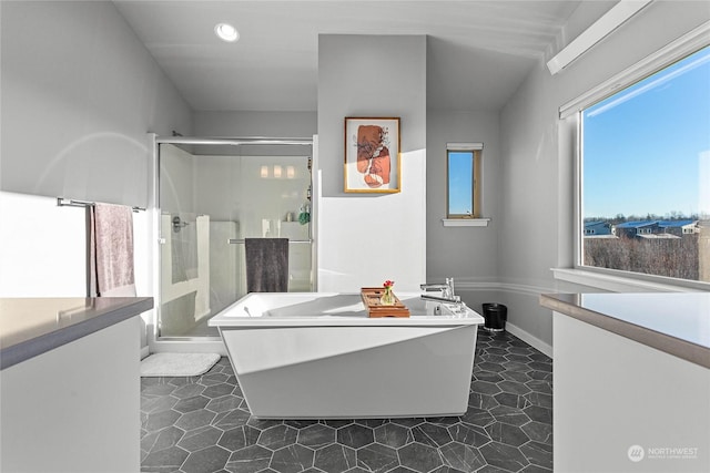 bathroom with vanity, separate shower and tub, and tile patterned floors