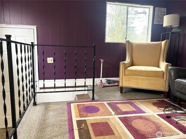 sitting room with wooden walls