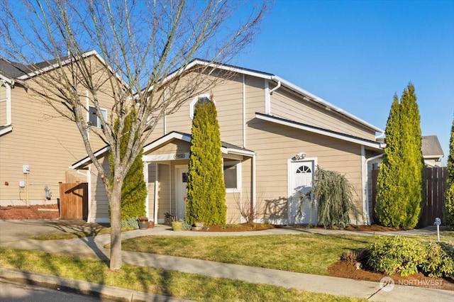 front of property featuring a front lawn