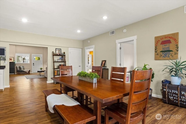 dining room featuring dark wood-type flooring