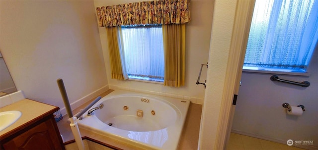 bathroom with vanity and a tub to relax in