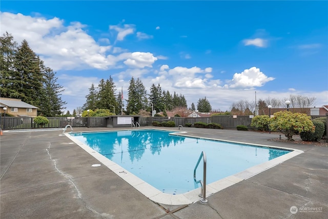 view of swimming pool featuring a patio