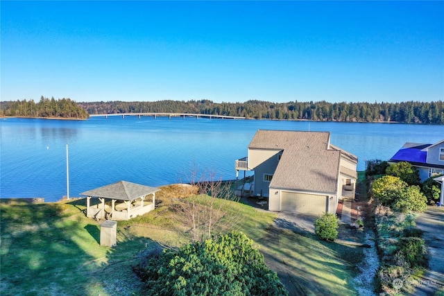 exterior space with a water view