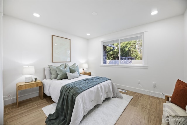 bedroom featuring light hardwood / wood-style floors