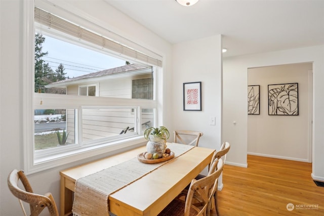 dining room with light wood-type flooring