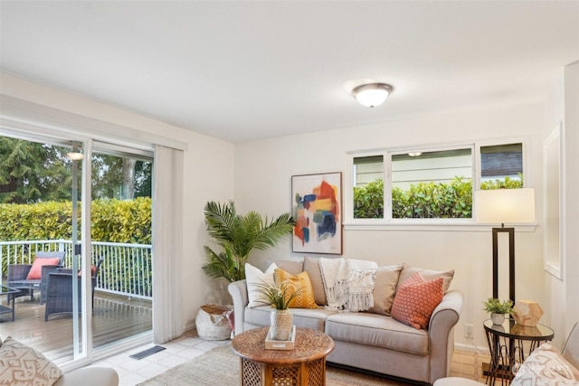 living room with plenty of natural light