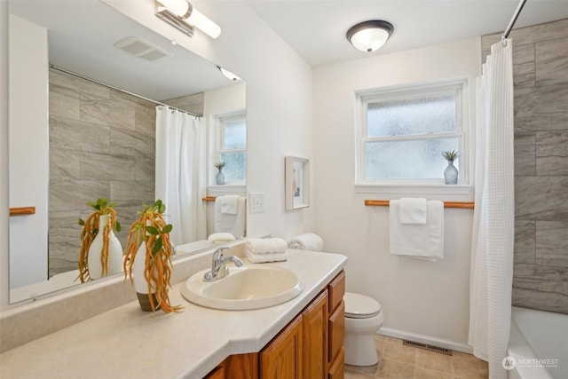 full bathroom with shower / bathtub combination with curtain, vanity, and toilet