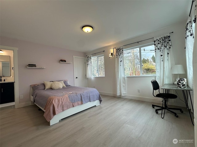 bedroom featuring hardwood / wood-style floors