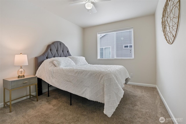 carpeted bedroom featuring a ceiling fan and baseboards