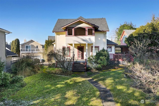 view of front of property with a front lawn