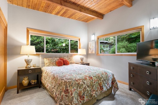 bedroom with wood ceiling, light carpet, and beamed ceiling