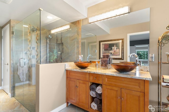 bathroom featuring vanity and walk in shower