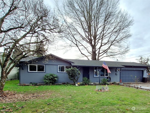 single story home with a garage and a front yard