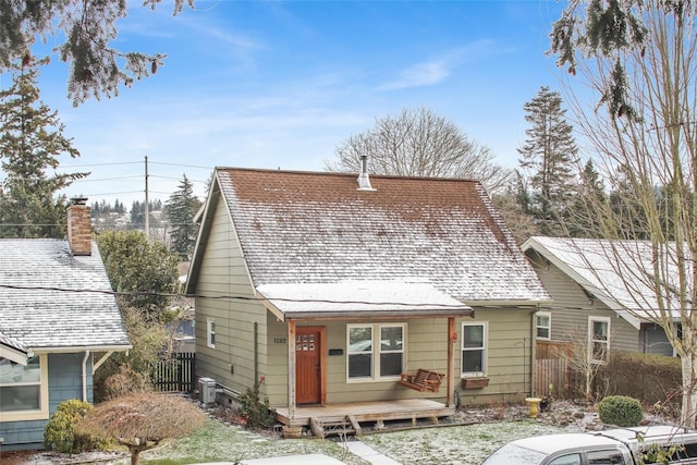 bungalow-style home featuring central air condition unit