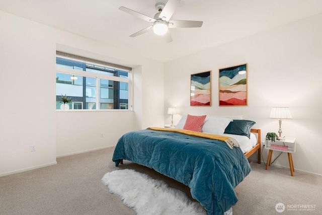 bedroom featuring ceiling fan and carpet flooring