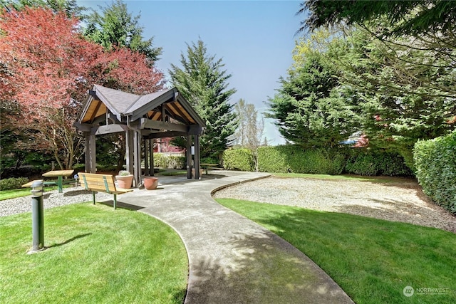 view of community with a gazebo and a lawn