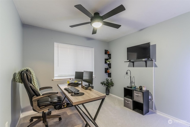 office featuring light colored carpet and ceiling fan