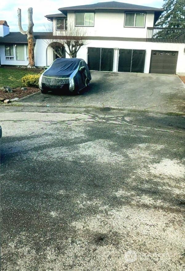 exterior space featuring a garage