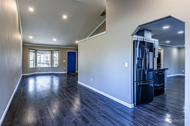 interior space featuring dark hardwood / wood-style flooring and crown molding