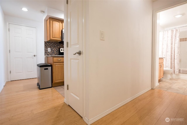 hallway featuring light wood-type flooring