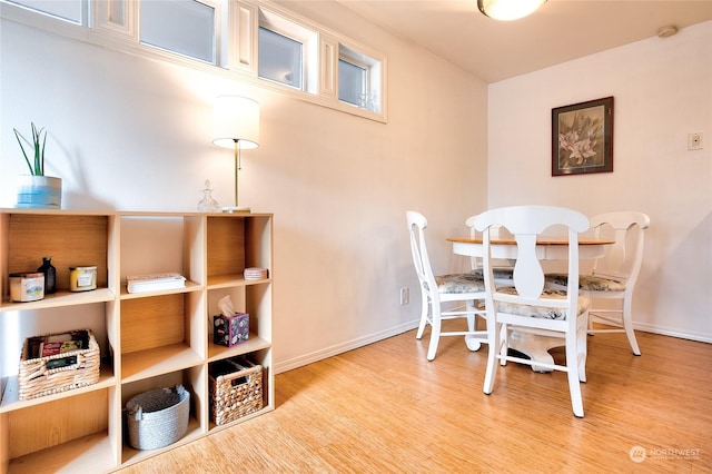 dining room with light wood-type flooring