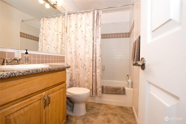 full bathroom featuring toilet, shower / tub combo, vanity, tile patterned flooring, and backsplash