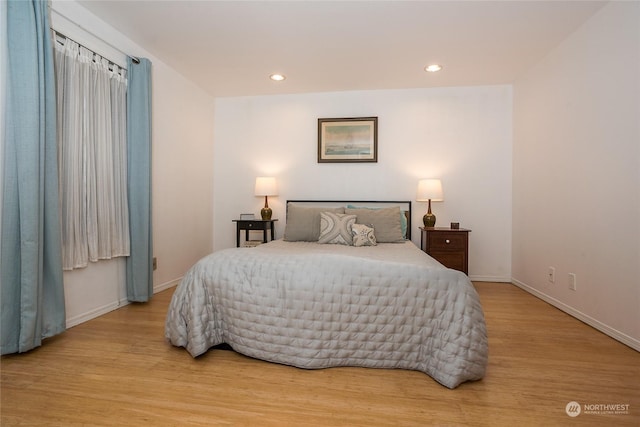 bedroom featuring light hardwood / wood-style flooring