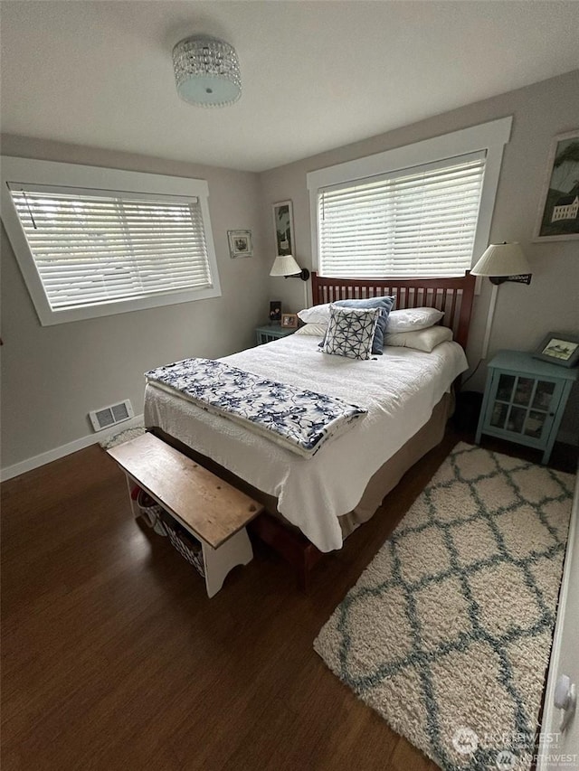 bedroom featuring wood-type flooring