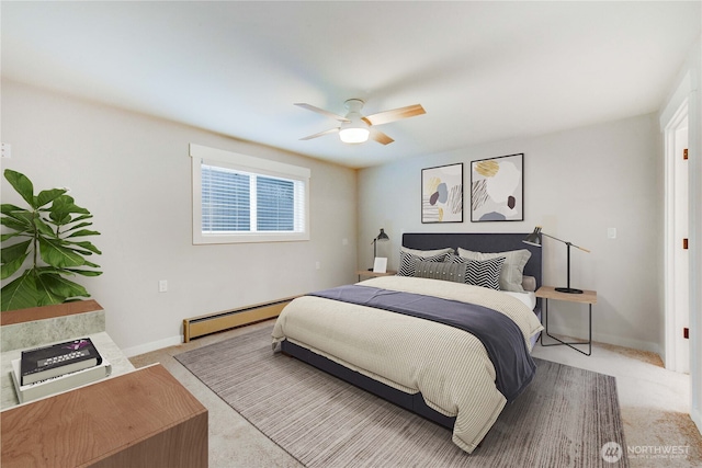 bedroom featuring a baseboard heating unit, baseboards, a ceiling fan, and light colored carpet