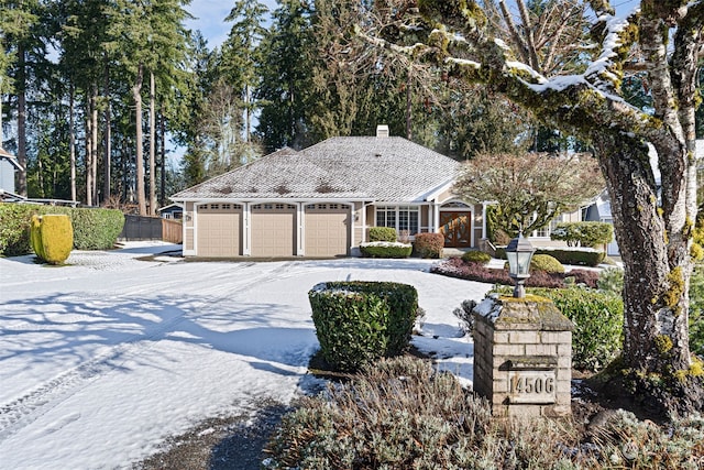 view of front of property featuring a garage