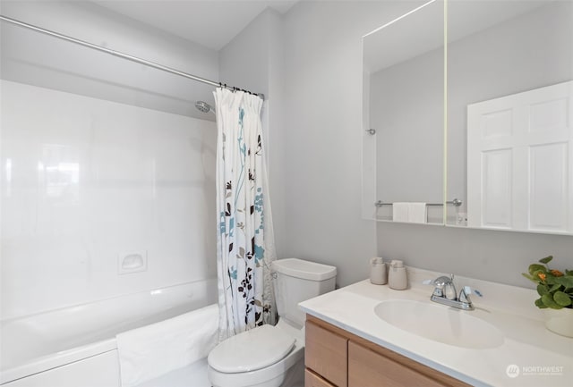 full bathroom featuring vanity, toilet, and shower / tub combo