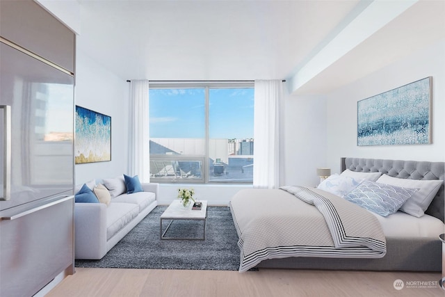 bedroom featuring hardwood / wood-style flooring