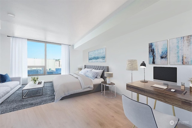 bedroom featuring light wood-type flooring