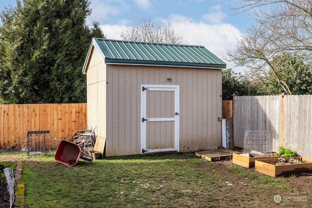 view of outbuilding featuring a yard