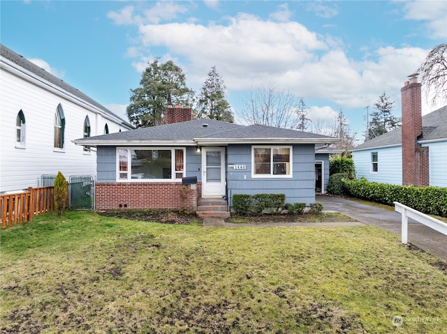 view of front of home with a front lawn