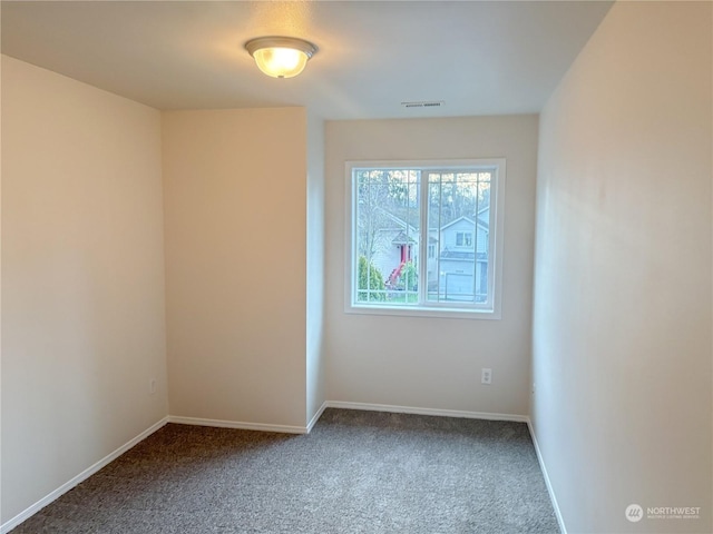 view of carpeted spare room