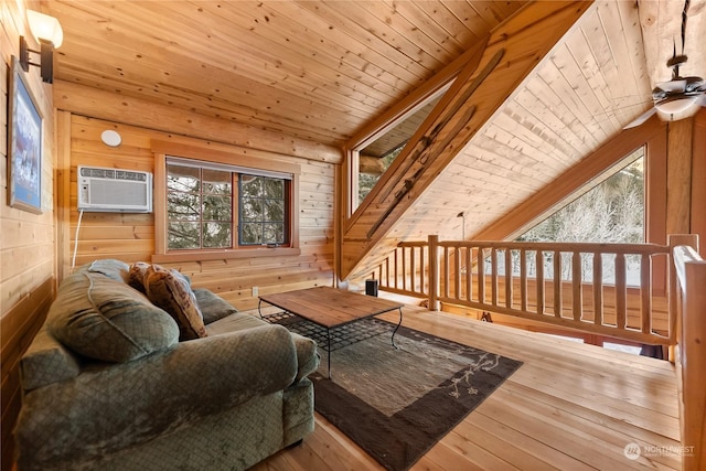 living room featuring hardwood / wood-style floors, wooden walls, vaulted ceiling, wooden ceiling, and an AC wall unit