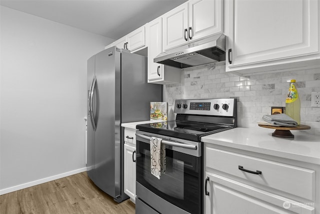 kitchen featuring white cabinetry, stainless steel electric stove, tasteful backsplash, and light wood-type flooring