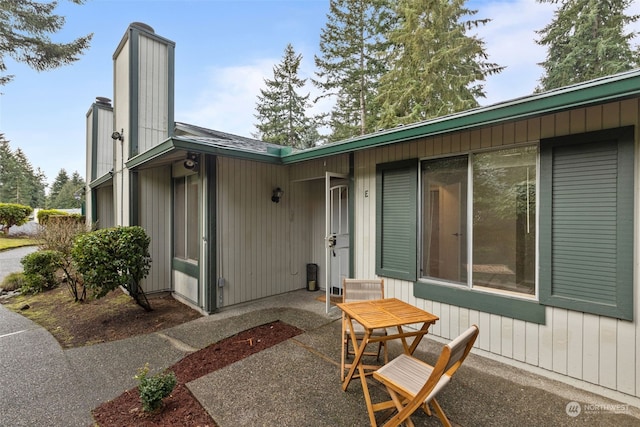 back of house with a patio area