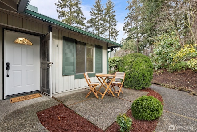 property entrance featuring a patio