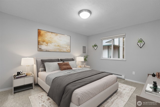 bedroom featuring a baseboard heating unit, baseboards, and carpet floors