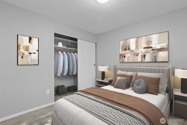 bedroom with a closet, baseboards, and carpet