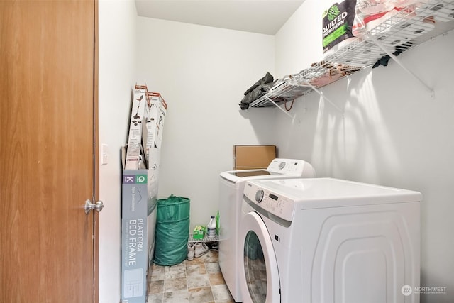 laundry area with washer and clothes dryer