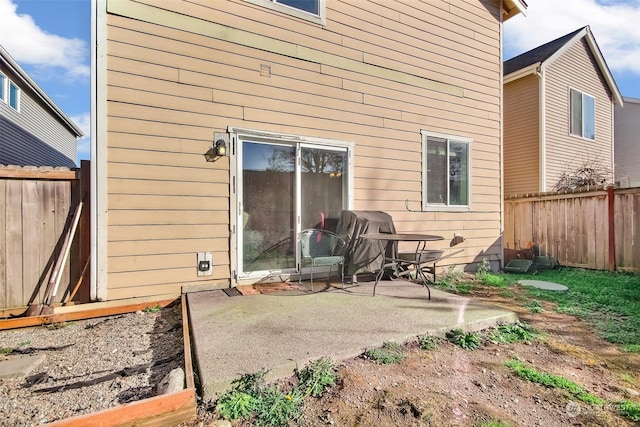 back of house featuring a patio