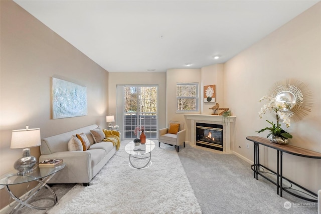 living room featuring light carpet